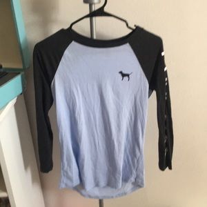 pink, blue and gray long sleeve shirt